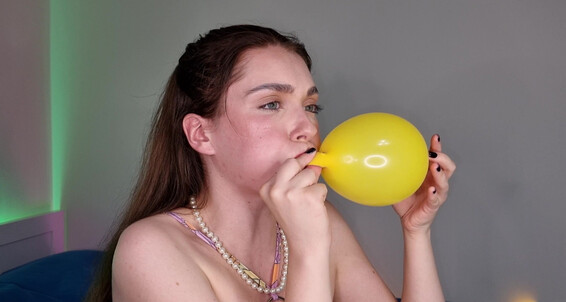 And Wetschoolgirl Blowing Balloon Puffing Cheeks